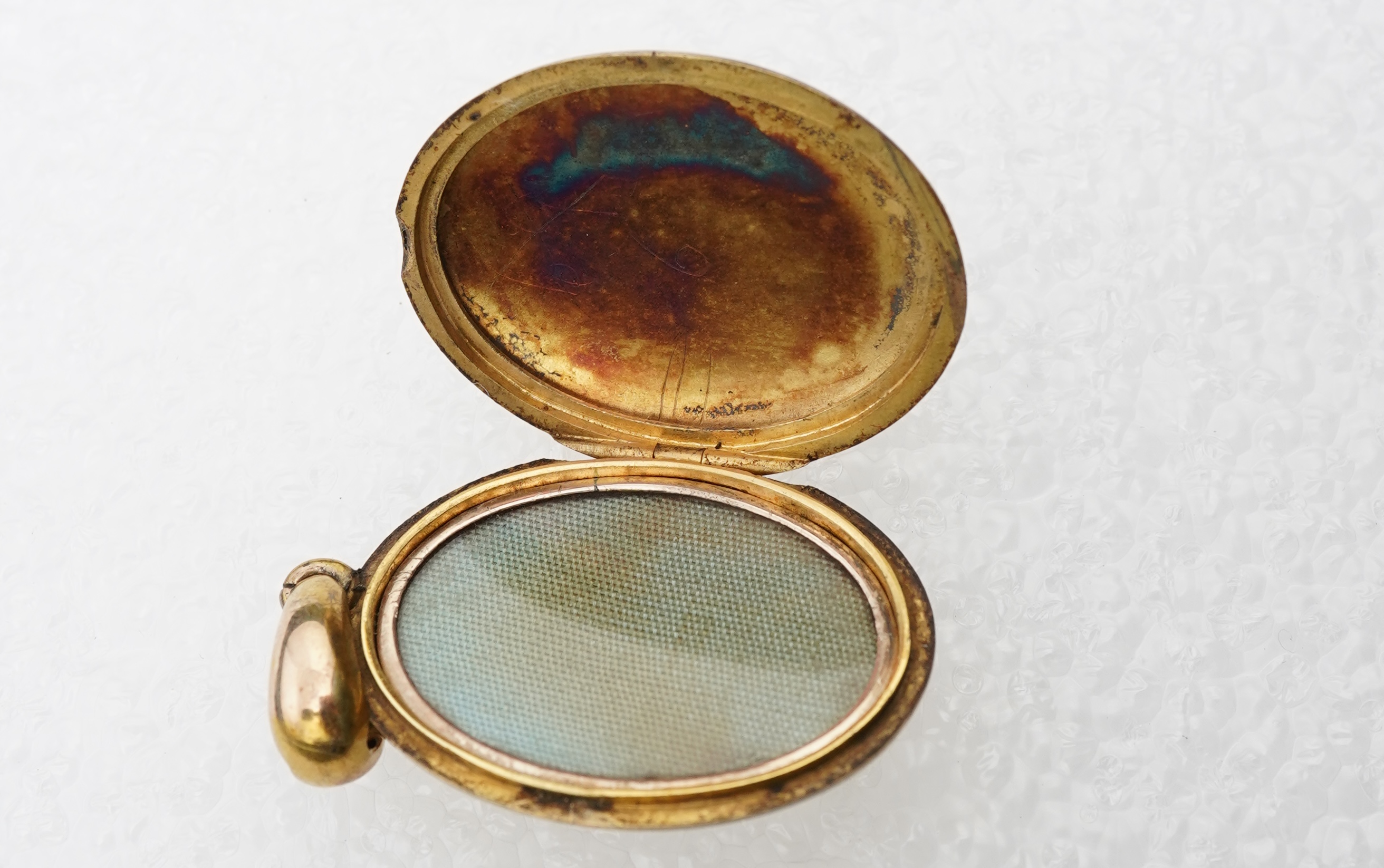 A Victorian enamel and pearl locket, late 19th century